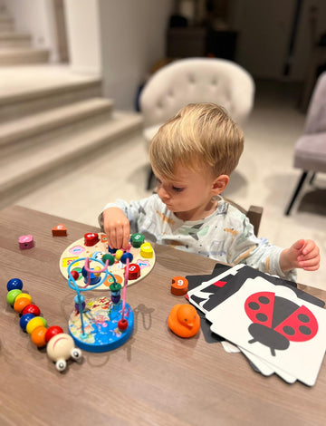 Child playing with toys specially selected to boost development 